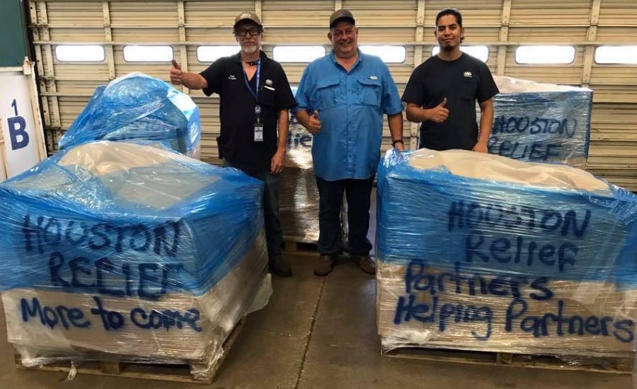 TDPartners load up donations to send to Houston. Photo credit: TDIndustries