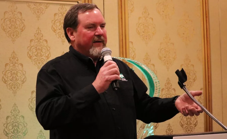 Mark Eatherton, executive director of the Radiant Professionals Alliance, speaks to members during an RPA event at the 2017 AHR Expo in Las Vegas