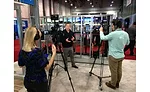 Uponor’s Daniel Worm films a video booth tour with BNP Media’s video team at the 2017 AHR Expo in Las Vegas