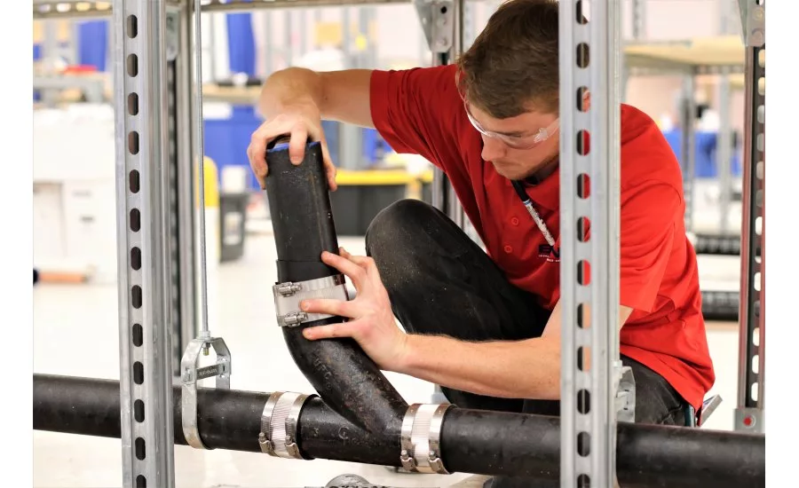 Twenty plumbing apprentices