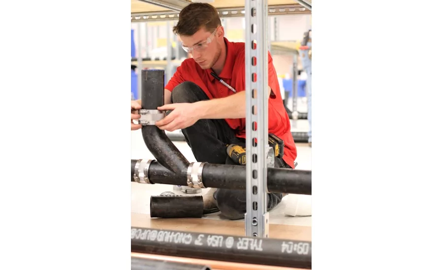 Twenty plumbing apprentices