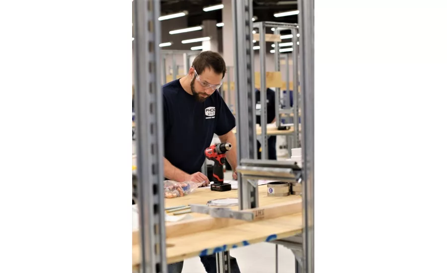 Twenty plumbing apprentices