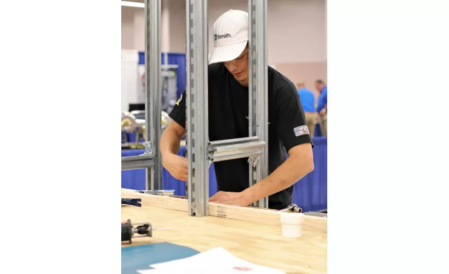 Twenty plumbing apprentices