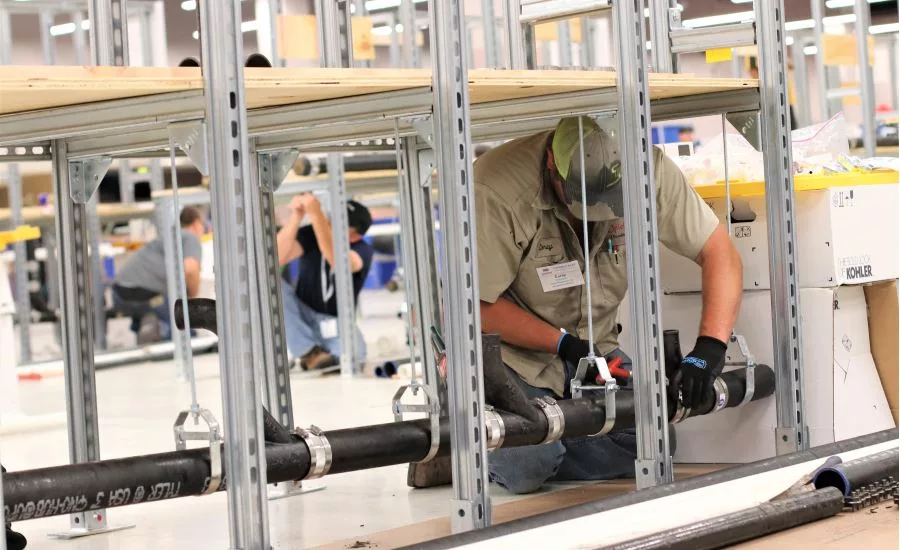 Twenty plumbing apprentices