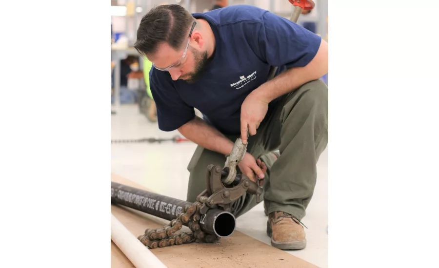 Twenty plumbing apprentices