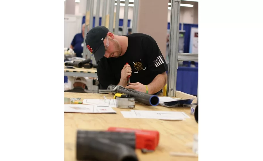 Twenty plumbing apprentices