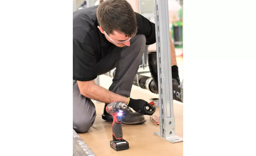 Twenty plumbing apprentices