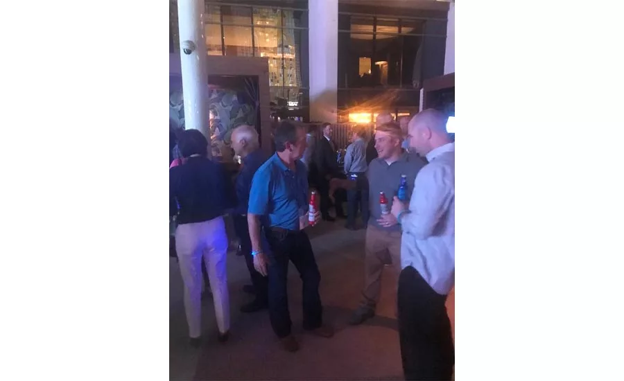 Conversation was in full bore during the after-hours rooftop party