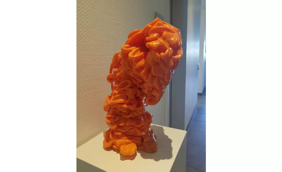 Art with pipe, displayed outside the Aquatherm kitchen and dining area