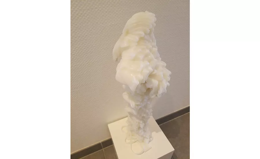 Art with pipe, displayed outside the Aquatherm kitchen and dining area