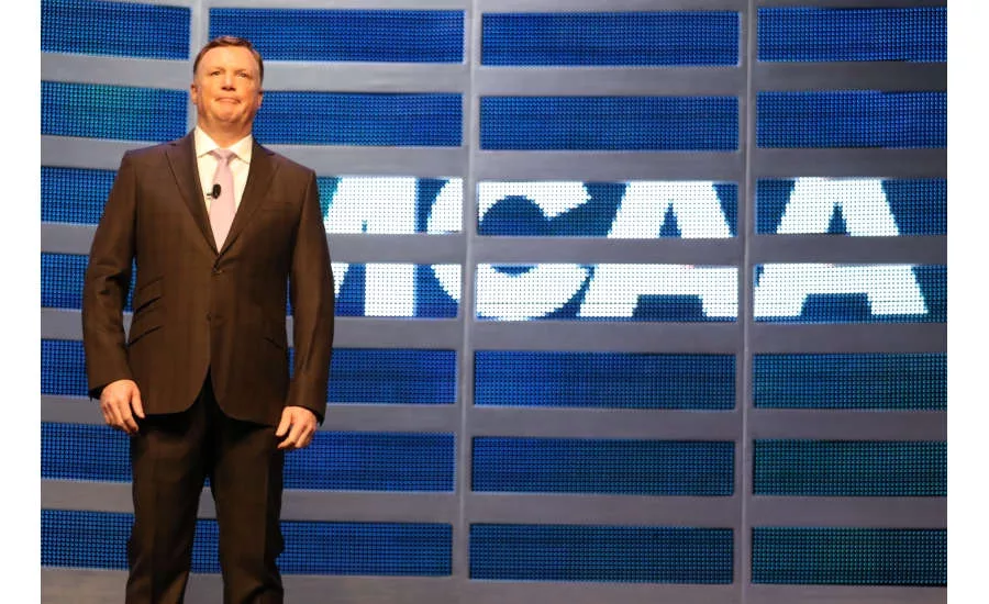 Tom Stone, outgoing MCAA president, greets MCAA 2017 attendees during the event’s opening session March 6 in San Diego