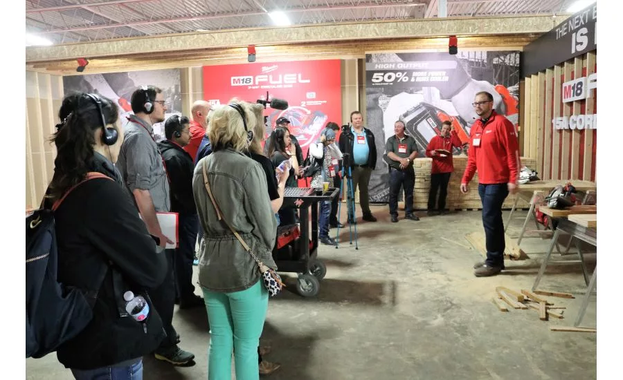 Contractors and members of the media attend Milwaukee Tool