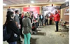 Contractors and members of the media attend Milwaukee Tool