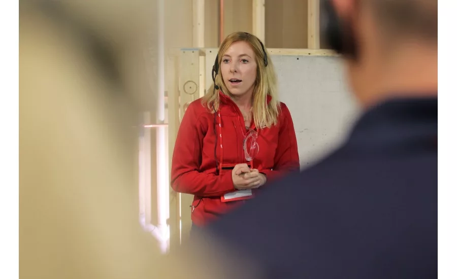 Associate Product Manager Caroline Lievens demonstrates the Big Hawg hole cutter