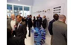 The wall of Moen bathroom accessories was a popular spot to mingle during the grand opening event