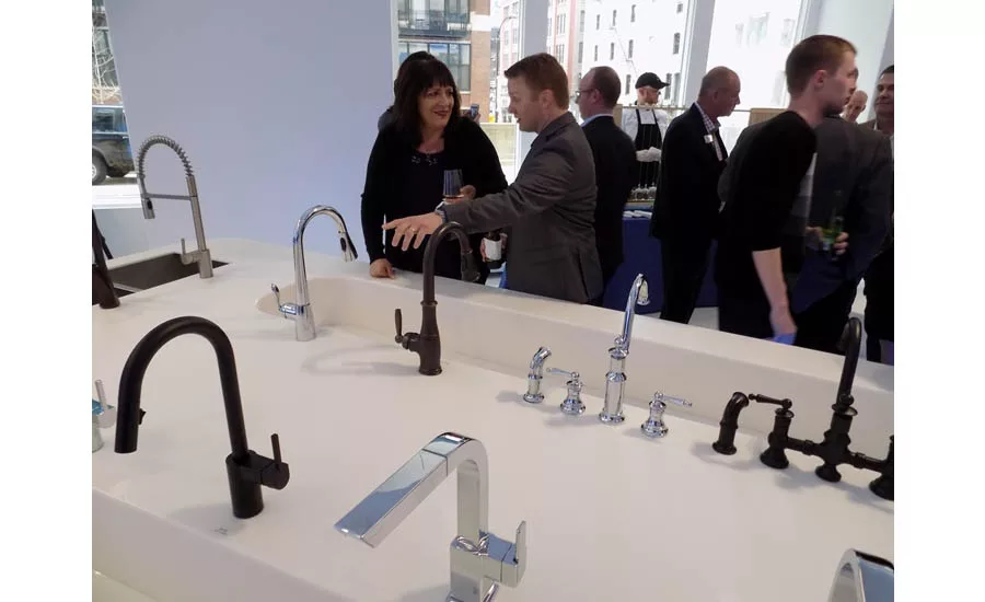 Visitors to check out one of the multiple rows of working Moen faucets