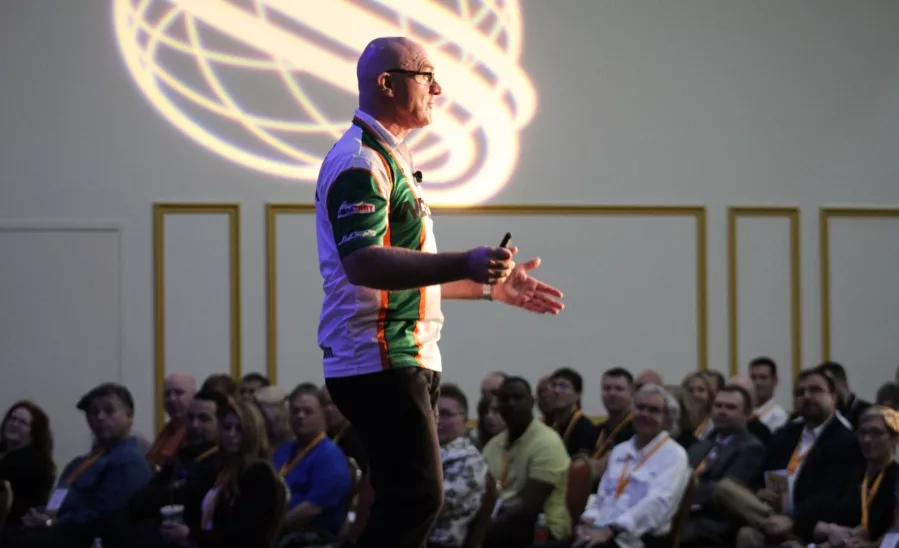 Irish driving legend Derek Daly delivers his keynote address to attendees of the inaugural Service World Expo, held Oct. 26-27 at the Tropicana Hotel in Las Vegas in Las Vegas