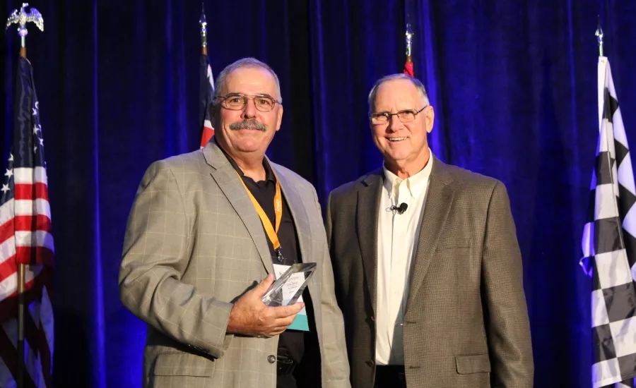 Joe Cunningham receives the inaugural Consultant of the Year award during Service World Expo in Las Vegas