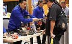 Attendees interact with vendors and other contractors at the Product Showcase during the 2017 Service World Expo in Las Vegas
