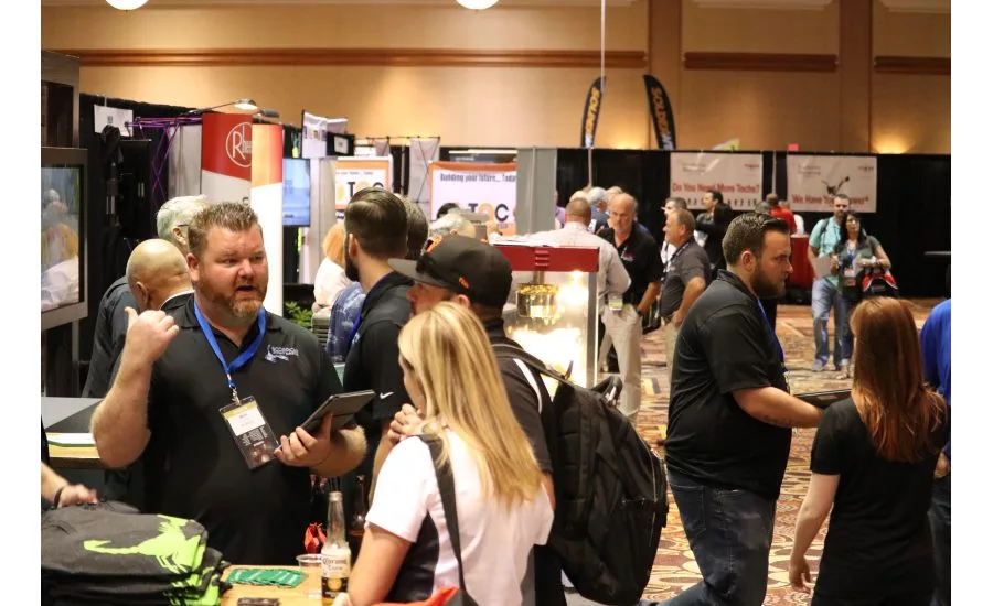 Attendees interact with vendors and other contractors during the Product Showcase at the 2017 Service World Expo in Las Vegas