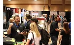 Attendees interact with vendors and other contractors during the Product Showcase at the 2017 Service World Expo in Las Vegas