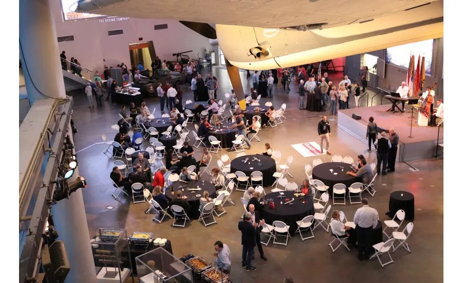 Service Roundtable members and partners attend an evening event