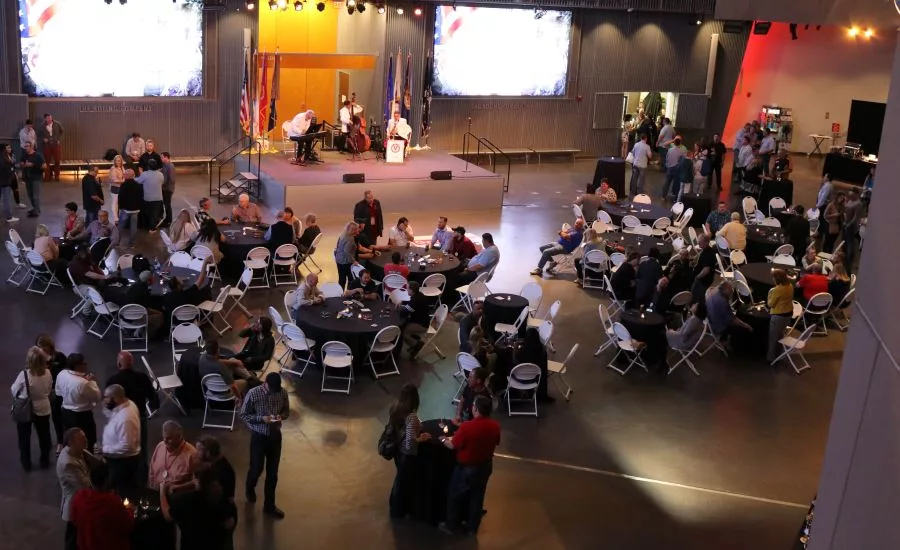 Service Roundtable members and partners attend an evening event