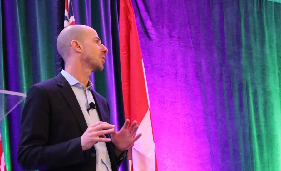 Closing keynote speaker Eric Remer speaks to attendees of the 2018 International Roundtable event