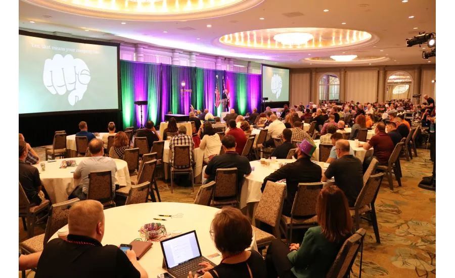 Closing keynote speaker Eric Remer speaks to attendees of the 2018 International Roundtable event