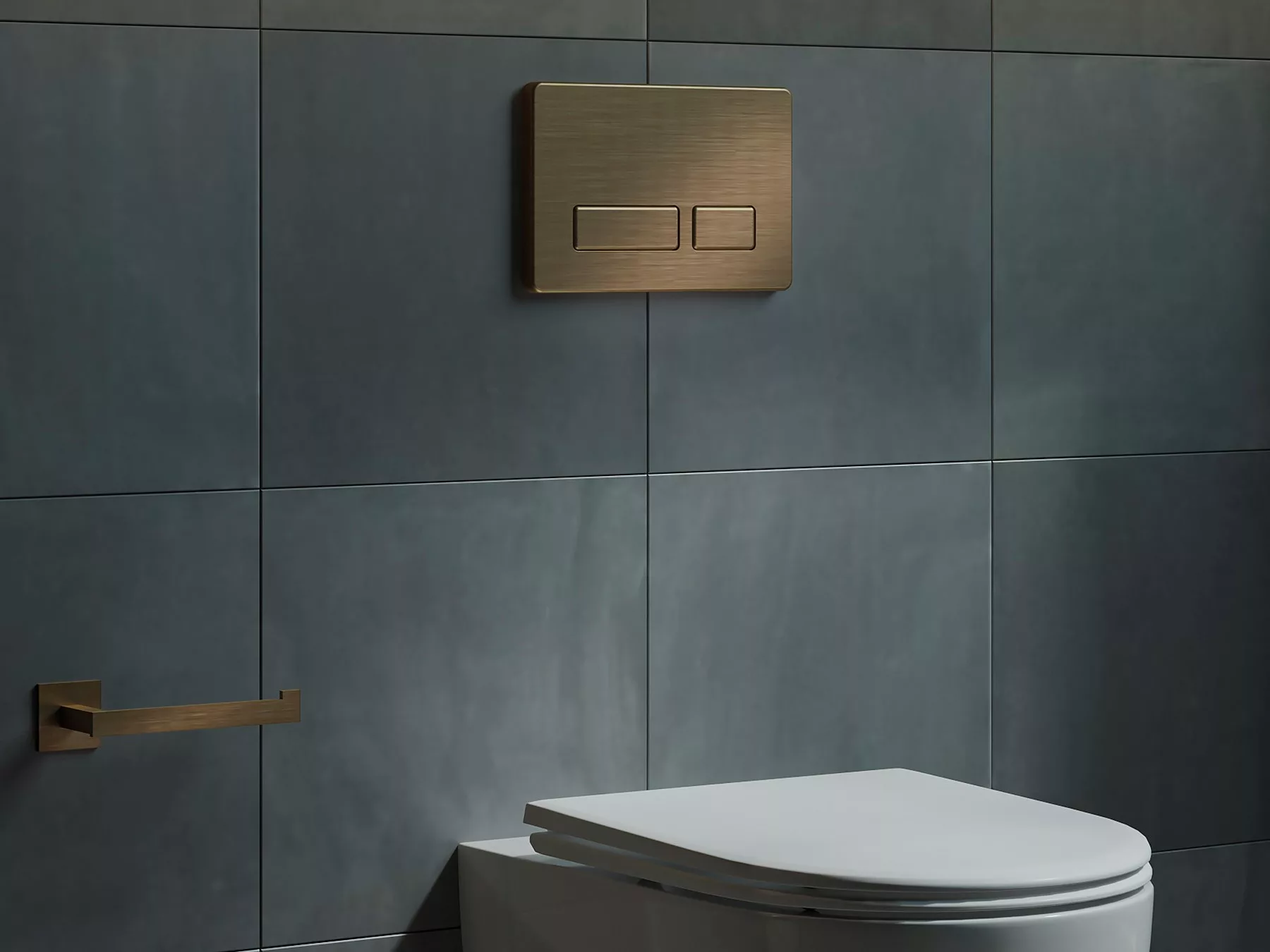 A bronze Wall Flush Plates from California Faucets on a bathroom wall.