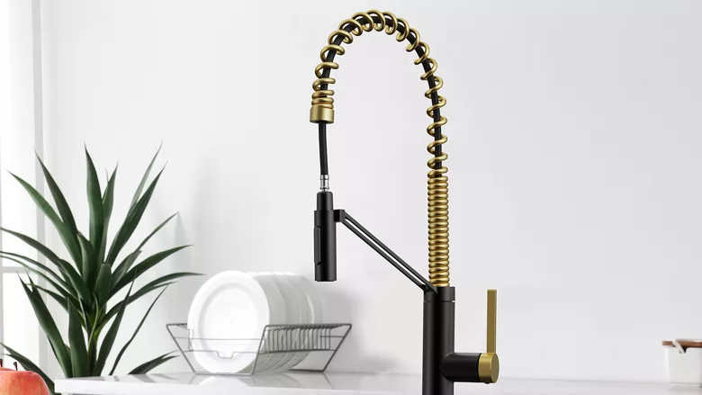 The Lenova Design Edition Kitchen in matte black and brushed brass. 