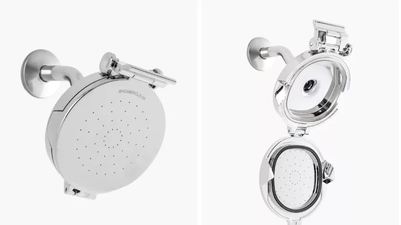 The new showerhead from ShowerClear being shown flipped open.