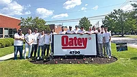 Oatey Co. hosts fifth annual ‘Ambassador Fest,’ its largest plumbing influencer event to date Several influencers standing around the Oatey Co. sign at Ambassador Fest.