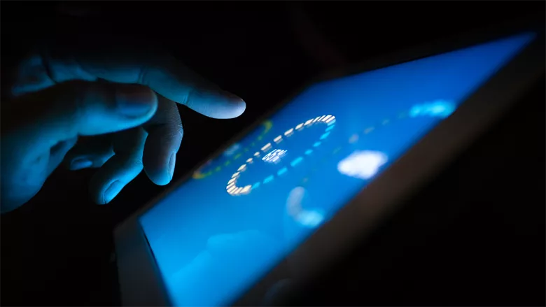 A person using a smart device. 