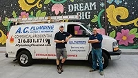 Michael and Anthony Caruso in front of the truck for A.C. Plumbing, Heating and Mechanical. 