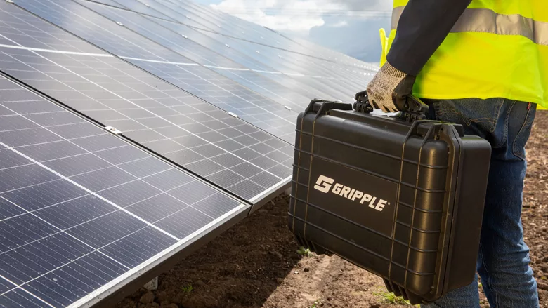 A person carrying a Gripple case.