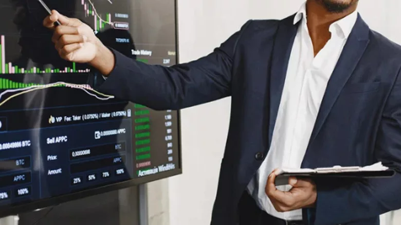 A business owner going over charts. 