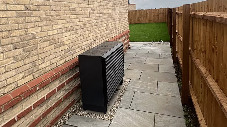 The newly installed air source heat pump.