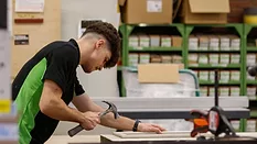 A young tradesperson at work. 