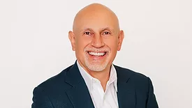 Javier Alarcón's headshot. 