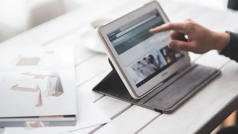 A person using a tablet. 