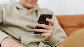 A person on a cellphone. 