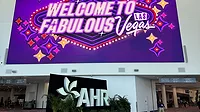 AHR Expo 2026 in Las Vegas Welcome to Fabulous Las Vegas marquee in shades of purple above the AHR sign.