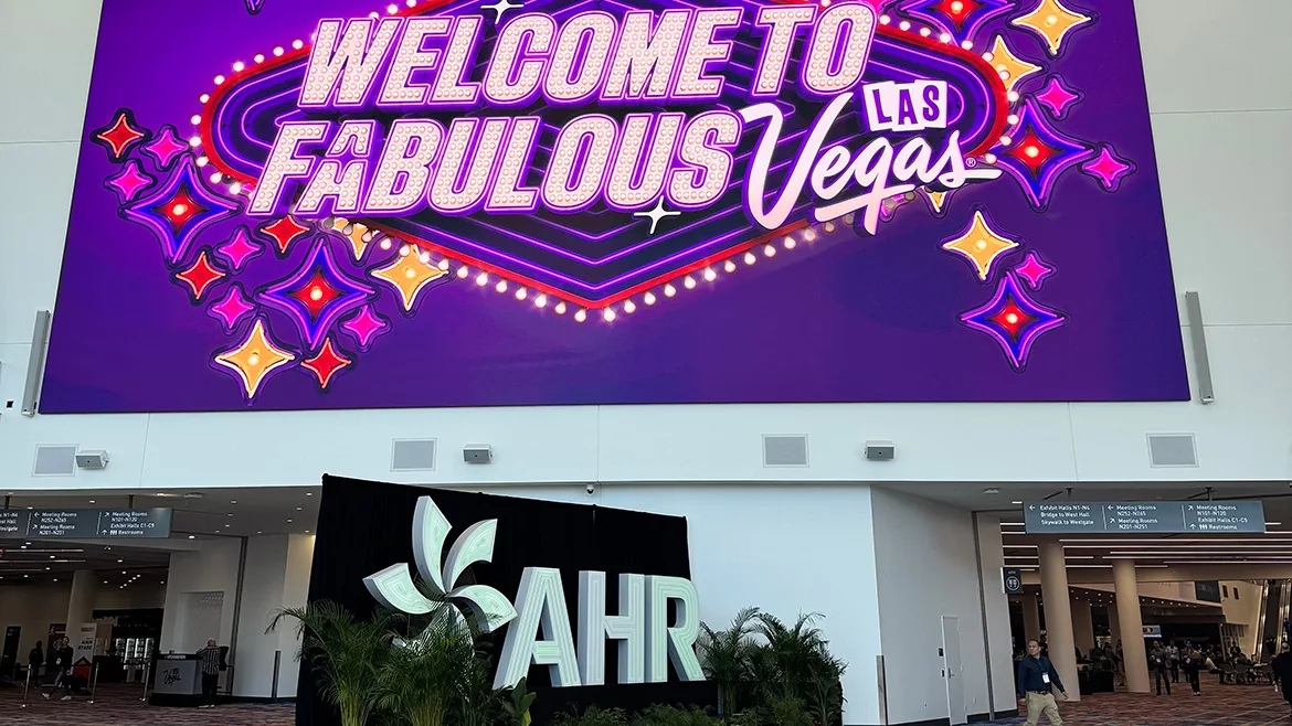 Welcome to Fabulous Las Vegas marquee in shades of purple above the AHR sign.