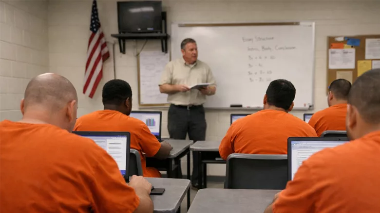 Several inmates being taught. 