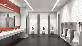 A commercial bathroom featuring Sloan products.