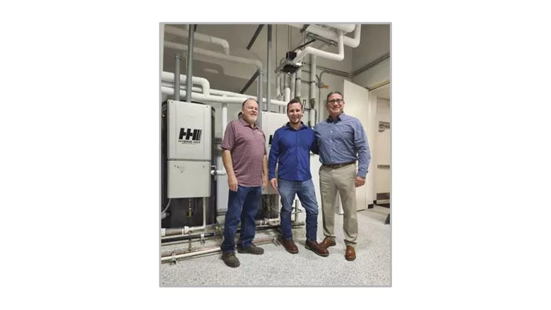 Shown with the new water heating system are Joel Eggebrecht (left) of Moeller Plumbing & Electrical, and Del Sol Food’s Antonio Vazquez (right - Vice President of Operations), and Ronnie Dudley (Maintenance Manager).