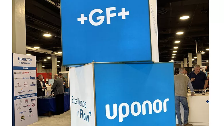 A display showing GF and Uponor's logos.