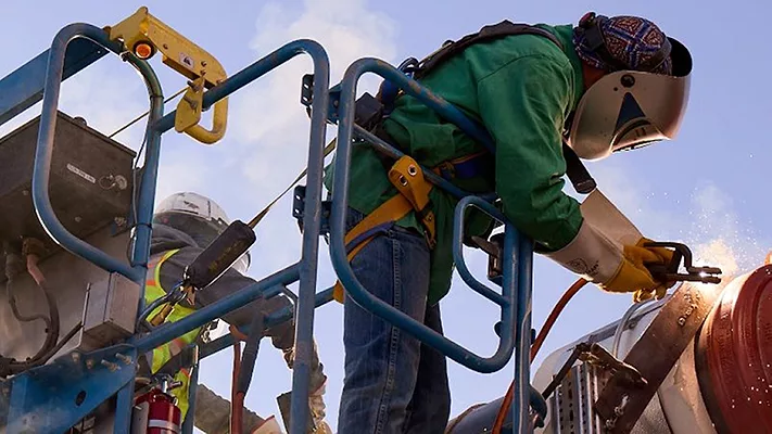 Two skilled trades workers.