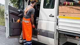 A person in a work truck.